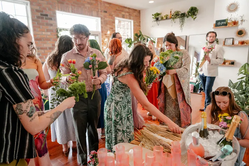 Guests arranging flowers at a workshop at Green Boutique