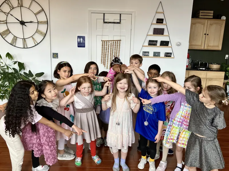 Group of children striking a pose at a Green Boutique birthday party
